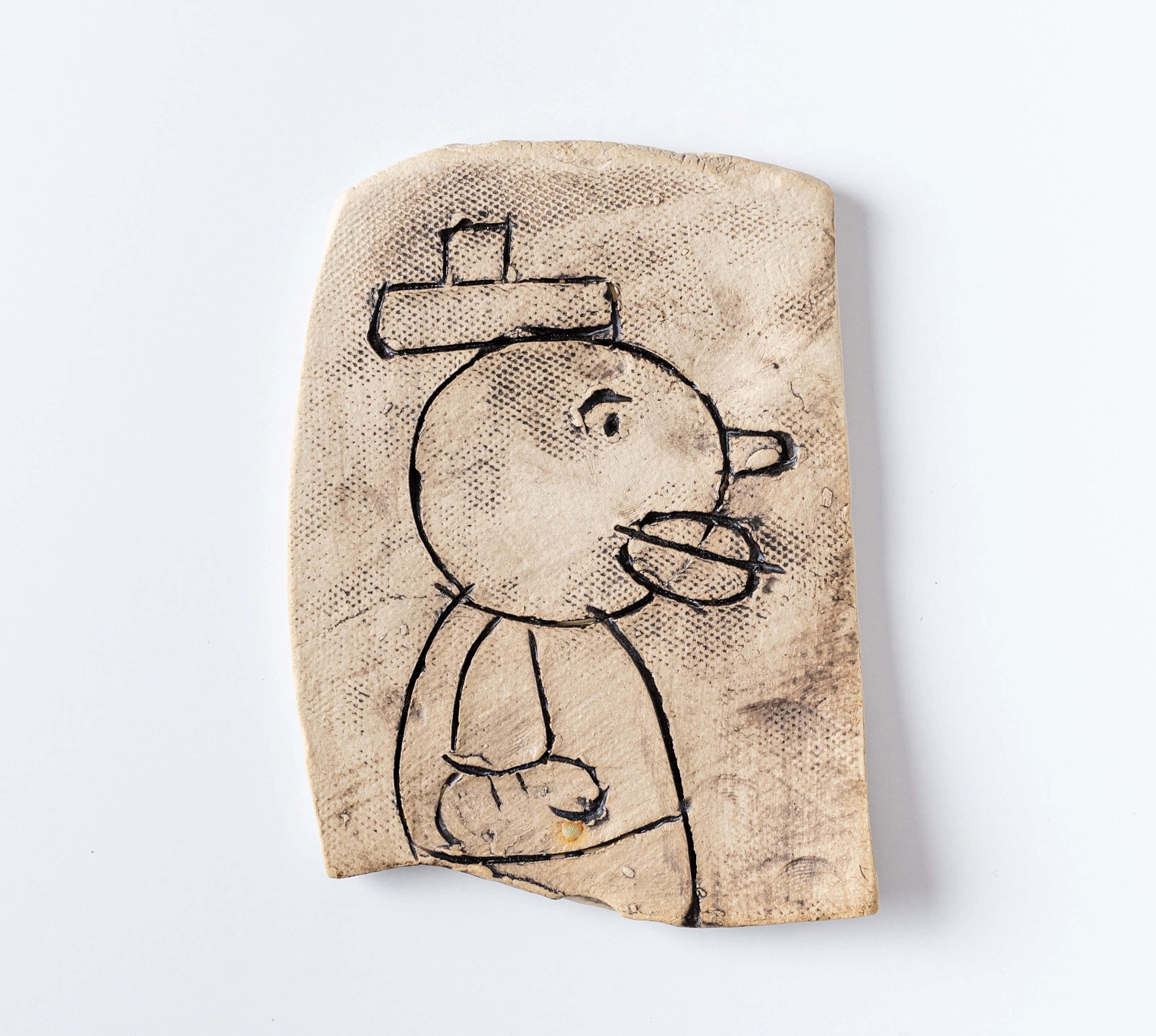 WTucker Art — ceramic piece with drawn character